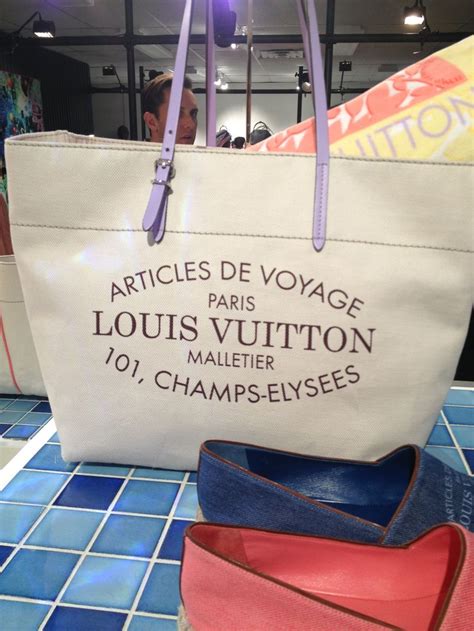 louis vuitton purse with two pockets in front|Louis Vuitton beach tote.